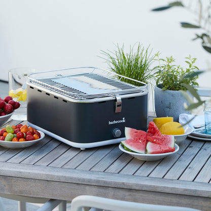 Barbecook Carlo charcoal table grill Urban Grey 44x33x21cm on table