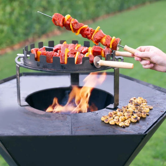 Barbecook Dynamic Centre skewer holder on cooktop